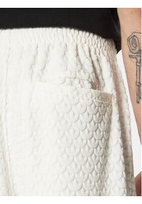 Adidas - adidas Spodnie dresowe Monogram Track JP4429 Biały Regular Fit. Kolor: biały. Materiał: syntetyk #4