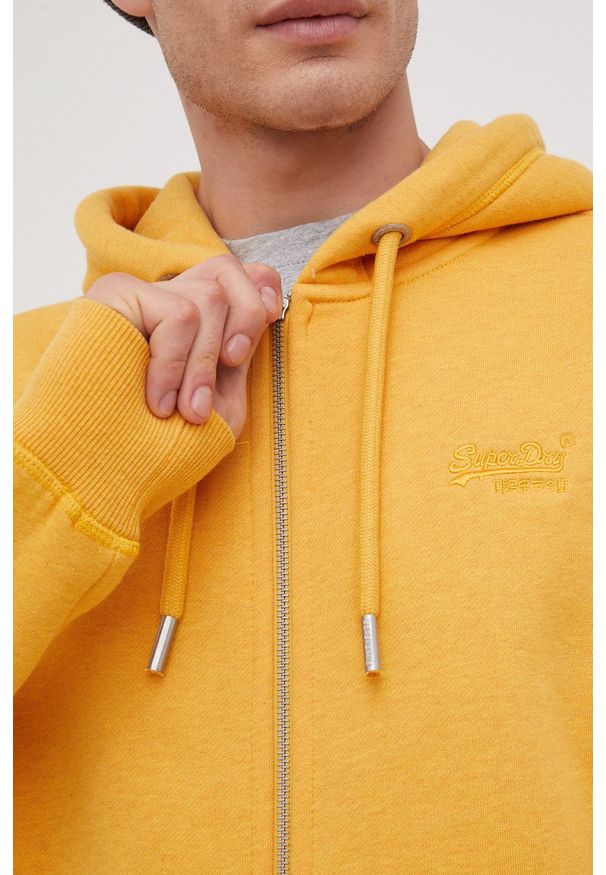 Superdry bluza męska kolor żółty z kapturem gładka. Typ kołnierza: kaptur. Kolor: żółty. Materiał: bawełna. Wzór: gładki