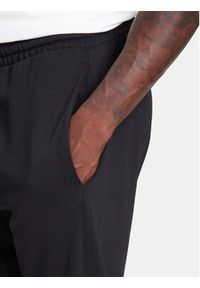Adidas - adidas Spodnie dresowe Essentials Big Logo IN6163 Czarny Regular Fit. Kolor: czarny. Materiał: bawełna, syntetyk #4