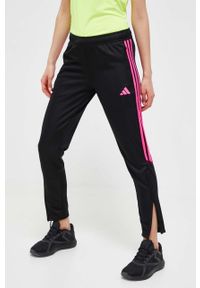adidas Performance spodnie treningowe Tiro 23 kolor czarny z aplikacją. Kolor: czarny. Materiał: skóra, materiał. Wzór: aplikacja. Sport: fitness #1