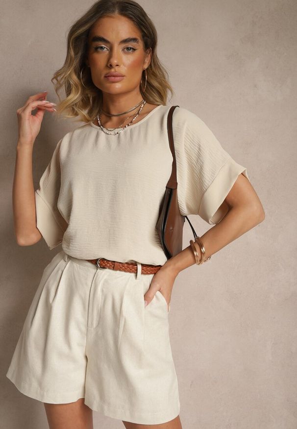 Renee - Beżowa Bluzka w Stylu Nietoperza Fadeasia. Okazja: na co dzień. Typ kołnierza: dekolt w serek. Kolor: beżowy. Styl: casual