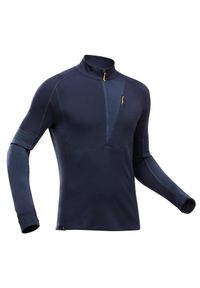 FORCLAZ - Koszulka trekkingowa z długim rękawem męska Forclaz MT900 merino. Typ kołnierza: kołnierzyk stójkowy. Kolor: niebieski. Materiał: wełna, materiał, akryl, poliamid, elastan. Długość rękawa: długi rękaw. Długość: długie. Sezon: zima #1