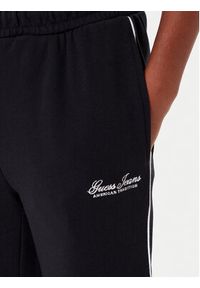 Guess Jeans Spodnie dresowe W5YB32 K68I4 Czarny Regular Fit. Kolor: czarny. Materiał: bawełna #5
