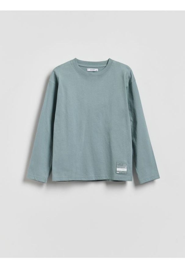 Reserved - Bawełniany longsleeve z nadrukiem - ciemny turkus. Materiał: bawełna. Długość rękawa: długi rękaw. Wzór: nadruk