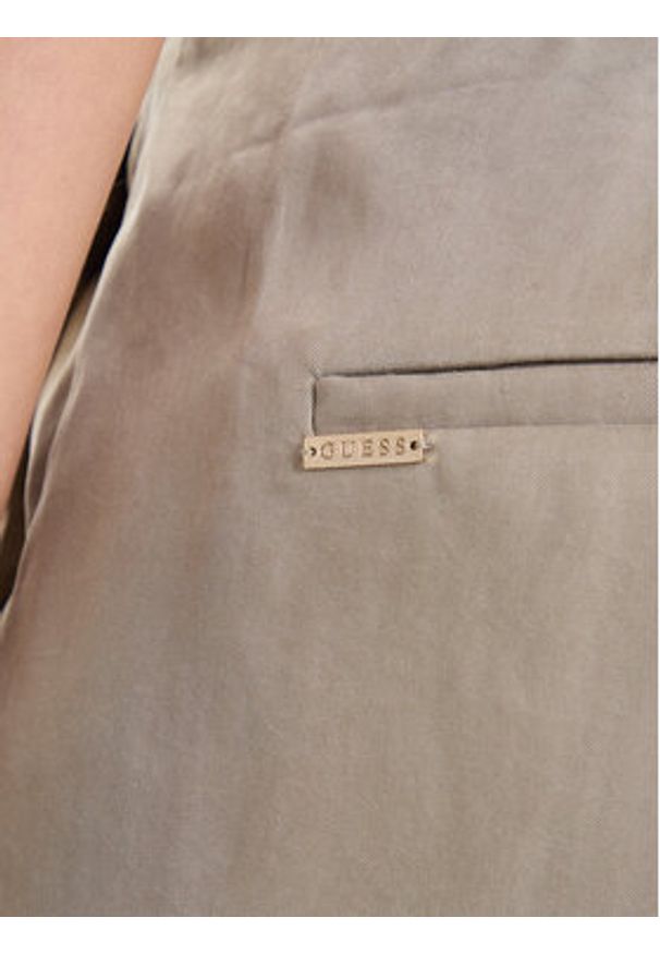 Guess Spodnie materiałowe W5YB02 WH5N2 Beżowy Regular Fit. Kolor: beżowy. Materiał: syntetyk