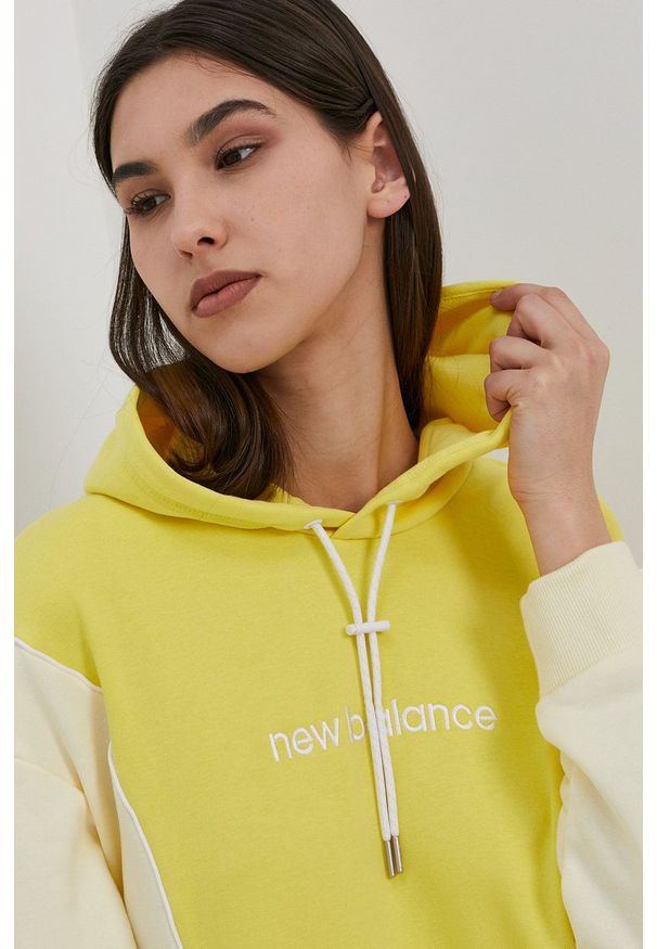 New Balance - Bluza. Okazja: na co dzień. Kolor: żółty. Długość rękawa: długi rękaw. Długość: długie. Styl: casual