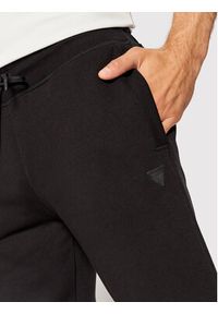 Guess Spodnie dresowe Z2YB22 KAIJ1 Czarny Regular Fit. Kolor: czarny. Materiał: bawełna #5