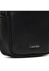 Calvin Klein Saszetka Ck Est. Pu Cube Reporter K50K511861 Czarny. Kolor: czarny. Materiał: skóra #4