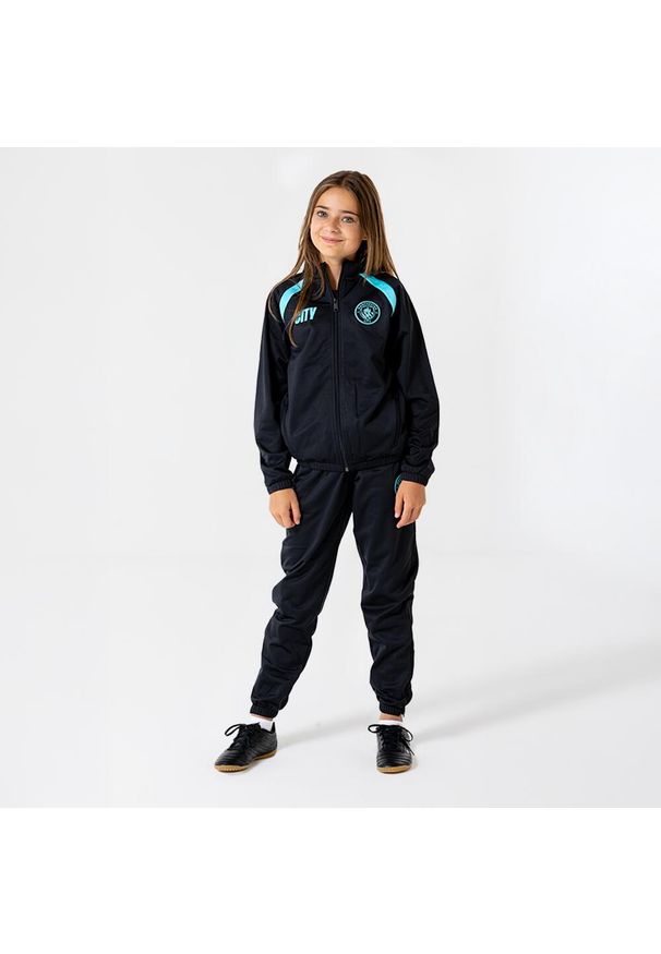 MANCHESTER CITY - Dres treningowy Manchester City dla dzieci 25/26 - Czarny. Kolor: czarny, niebieski, wielokolorowy. Materiał: dresówka. Styl: sportowy
