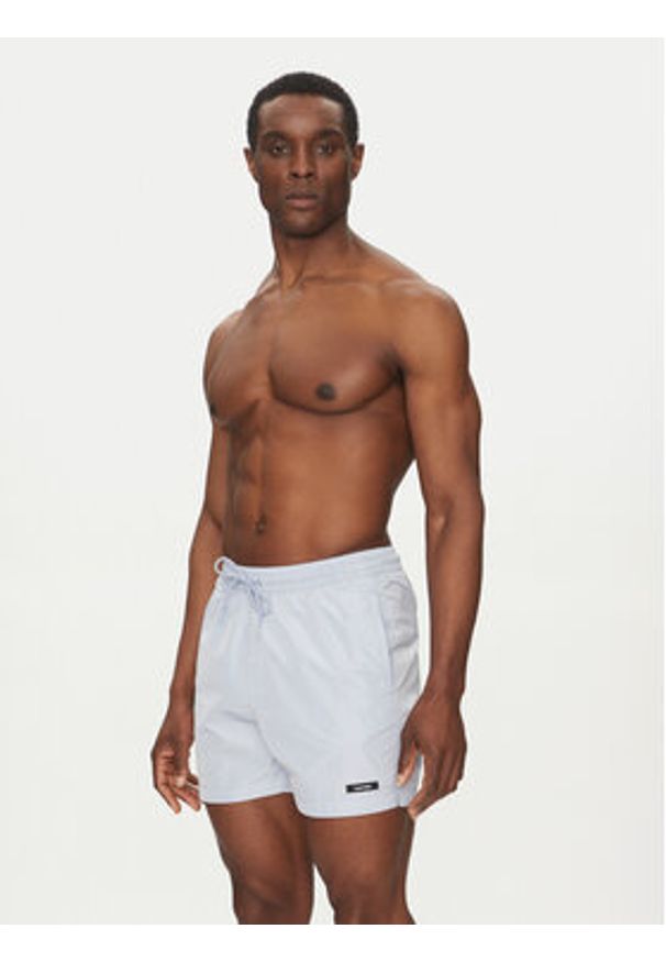Calvin Klein Swimwear Szorty kąpielowe KM0KM01111 Niebieski Regular Fit. Kolor: niebieski. Materiał: syntetyk