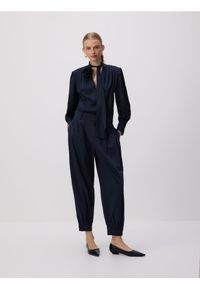 Reserved - Spodnie barrel leg - granatowy. Kolor: niebieski. Materiał: tkanina, wełna #1