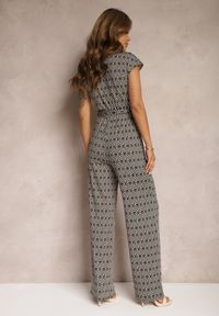 Renee - Czarno-Beżowy Kombinezon z Dodatkiem Wiskozy z Wiązaniem w Talii w Geometryczny Wzór Trosofia. Kolor: czarny. Materiał: wiskoza. Wzór: geometria. Sezon: lato #4