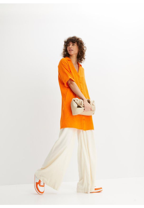 bonprix - Długa bluzka oversize z miękkiego muślinu. Kolor: pomarańczowy. Materiał: bawełna. Długość: długie