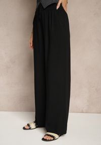 Renee - Czarne Szerokie Spodnie z Wiskozy High Waist Naivella. Okazja: na co dzień. Stan: podwyższony. Kolor: czarny. Materiał: wiskoza. Styl: elegancki, casual #5