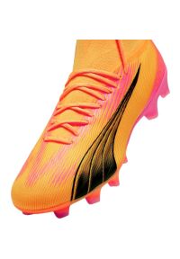 Buty piłkarskie Puma Ultra Pro FG/AG M 107750 03 pomarańczowe. Kolor: pomarańczowy. Szerokość cholewki: normalna. Sport: piłka nożna