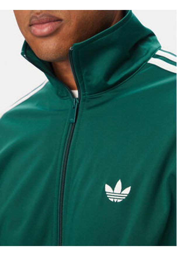 Adidas - adidas Bluza Firebird KD8314 Zielony Loose Fit. Kolor: zielony. Materiał: syntetyk