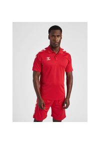 Polo Hummel hmlCore. Typ kołnierza: polo. Kolor: czerwony, wielokolorowy, różowy. Materiał: jersey. Sezon: lato