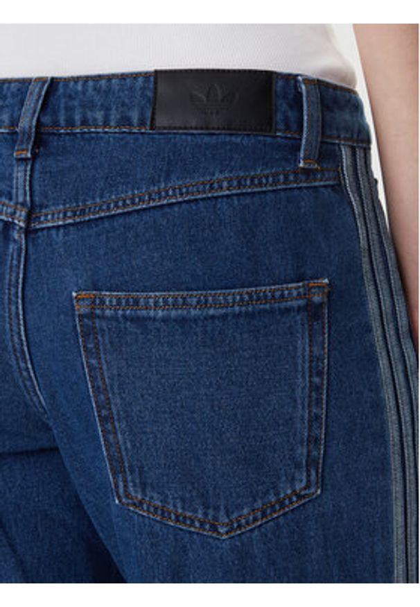 Adidas - adidas Jeansy Firebird KD2935 Niebieski Regular Fit. Kolor: niebieski