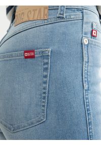 Big-Star - Jeansy damskie bootcut z rozcięciami jasnoniebieskie Blake 219. Kolor: niebieski