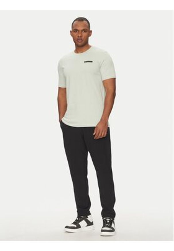 Under Armour T-Shirt Strip Logo 1390203 Écru Relaxed Fit. Materiał: syntetyk, bawełna