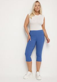 Born2be - Niebieskie Spodnie z Bawełny o Kroju Capri Dolonisa. Okazja: na co dzień. Kolor: niebieski. Materiał: bawełna. Styl: młodzieżowy, elegancki, casual #7