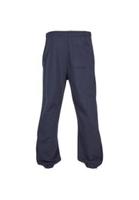 Urban Classics - Męskie Spodnie Dresowe. Kolor: niebieski. Materiał: dresówka. Długość: długie
