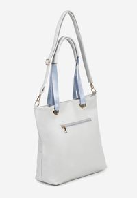Renee - Niebieska Torebka Typu Shopperka Ozdobiona Metalicznymi Aplikacjami Gonevia. Kolor: niebieski. Wzór: aplikacja. Dodatki: z aplikacjami. Styl: biznesowy, sportowy, casual