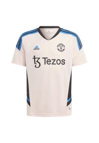 Adidas - Koszulka treningowa dla dzieci Manchester United Condivo 2022/23. Kolor: różowy. Sport: piłka nożna #1