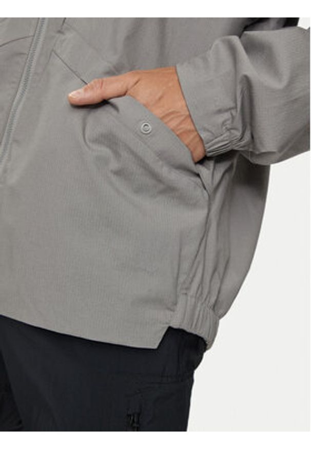 Adidas - adidas Wiatrówka Terrex Xploric IK9115 Szary Regular Fit. Kolor: szary. Materiał: bawełna