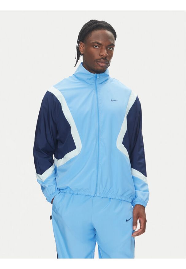 Nike Wiatrówka Icon FZ0248 Niebieski Relaxed Fit. Kolor: niebieski. Materiał: syntetyk