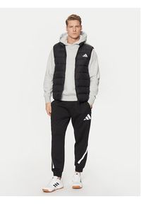 Adidas - adidas Bezrękawnik Essentials 3-Stripes JJ1203 Czarny Slim Fit. Kolor: czarny. Materiał: syntetyk. Długość rękawa: bez rękawów #4