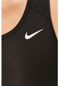 Nike - Biustonosz sportowy. Kolor: czarny. Materiał: tkanina, włókno, skóra. Rodzaj stanika: odpinane ramiączka. Technologia: Dri-Fit (Nike) #4