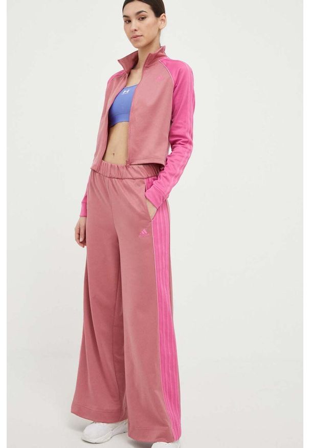 Adidas - adidas dres damski kolor pomarańczowy. Kolor: pomarańczowy. Materiał: dresówka