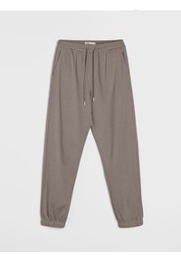Sinsay - Dresowe spodnie jogger terry - brązowy. Kolor: brązowy. Materiał: dresówka