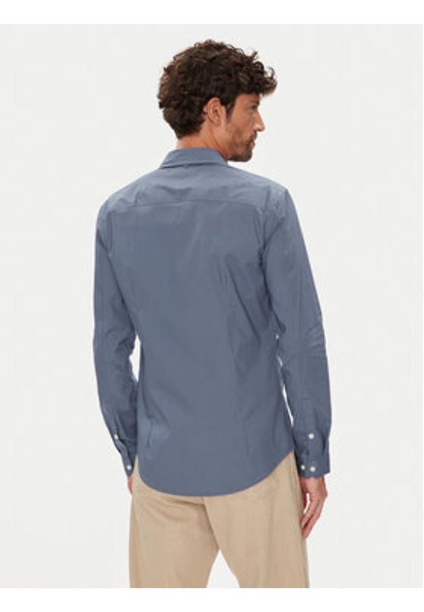 Tommy Jeans Koszula Original DM0DM04405 Niebieski Slim Fit. Kolor: niebieski. Materiał: bawełna