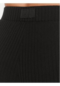 Guess Spodnie piżamowe O3BB01 KBXB2 Czarny Relaxed Fit. Kolor: czarny. Materiał: syntetyk