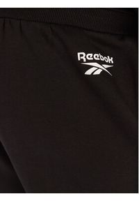 Reebok Spodnie dresowe Walker RK25149CCM Czarny Regular Fit. Kolor: czarny. Materiał: bawełna