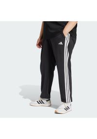 Adidas - Spodnie Essentials 3-Stripes French Terry Cuffed. Kolor: czarny, biały, wielokolorowy. Materiał: materiał. Sport: fitness