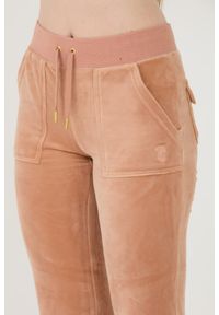 Juicy Couture - JUICY COUTURE Beżowe spodnie dresowe Del Ray Gold Pocketed Pant. Kolor: beżowy. Materiał: dresówka