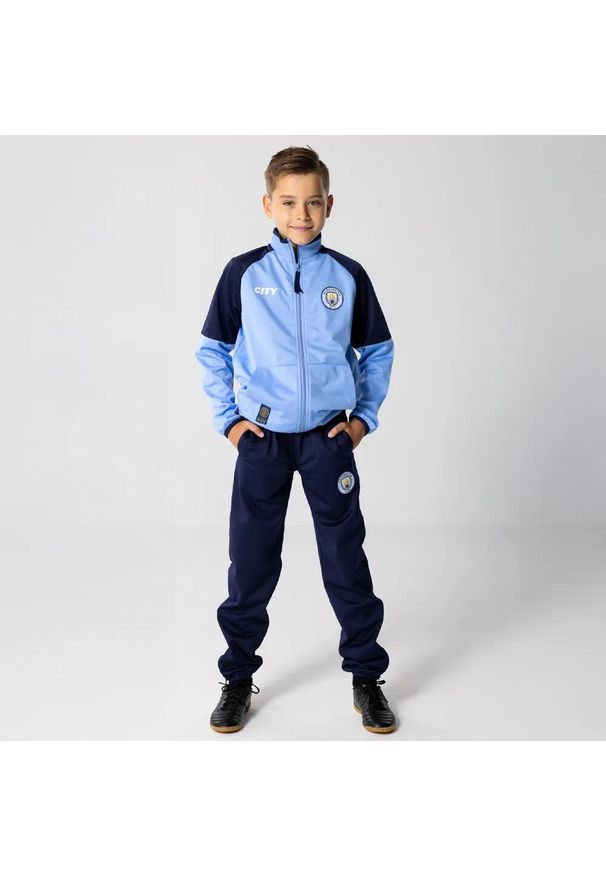 MANCHESTER CITY - Dres piłkarski dziecięcy Manchester City 24/25. Kolor: niebieski. Materiał: dresówka. Styl: sportowy