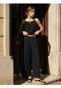 Sinsay - Spodnie wide leg z domieszką lnu - czarny. Kolor: czarny. Materiał: len