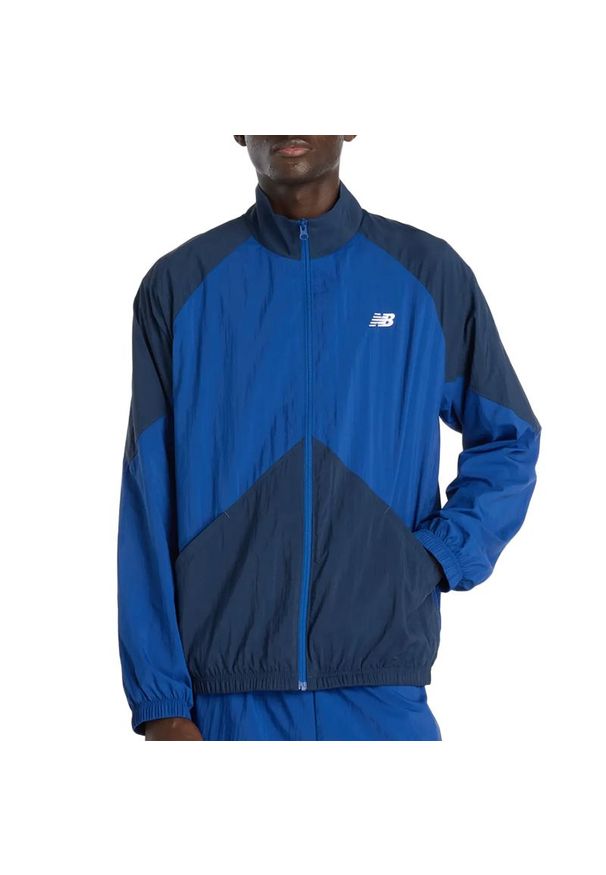 Kurtka męska New Balance MJ61J73YNNY - granatowa. Typ kołnierza: kołnierzyk stójkowy. Kolor: niebieski. Materiał: materiał, poliester. Sezon: jesień, wiosna