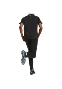Puma - Spodnie dresowe Borussia Dortmund 2022/23. Kolor: czarny. Materiał: dresówka. Sport: piłka nożna #1
