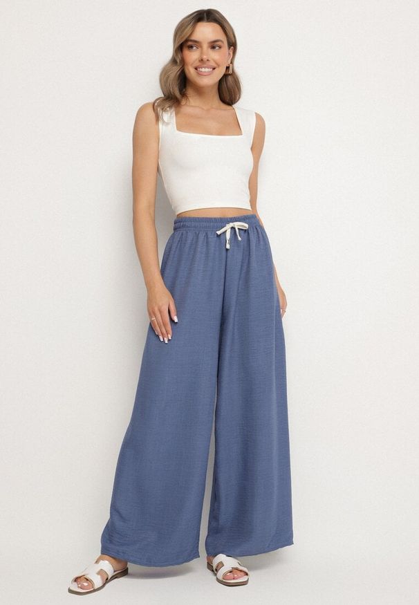 Born2be - Granatowe Szerokie Spodnie z Bawełny Ozdobione Wiązaniem Evipolli. Okazja: na co dzień. Kolor: niebieski. Materiał: bawełna. Wzór: aplikacja. Styl: casual, klasyczny