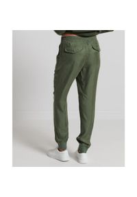 Spodnie turystyczne damskie Superdry Studios Supro Woven Jogger. Kolor: zielony. Materiał: wiskoza