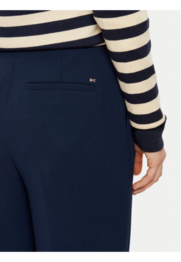 TOMMY HILFIGER - Tommy Hilfiger Spodnie materiałowe WW0WW45445 Granatowy Regular Fit. Kolor: niebieski. Materiał: syntetyk