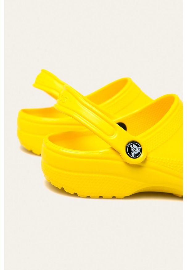 Crocs - Klapki. Kolor: żółty. Materiał: guma, materiał. Wzór: gładki
