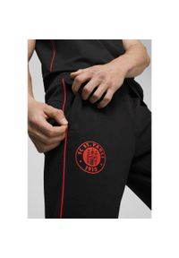 Puma - Męskie spodnie Casuals FC St. Pauli PUMA Black Red. Kolor: czarny, czerwony, wielokolorowy
