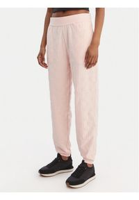 Hugo - HUGO Spodnie dresowe Monogram 50556809 Różowy jasny Regular Fit. Kolor: różowy. Materiał: bawełna #1