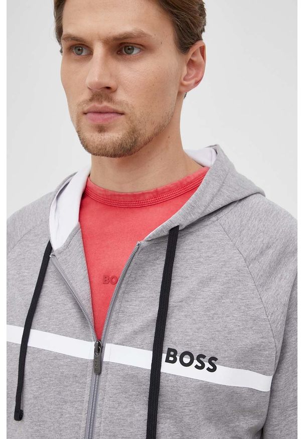 BOSS - Boss bluza bawełniana męska kolor szary z kapturem melanżowa. Okazja: na co dzień. Typ kołnierza: kaptur. Kolor: szary. Materiał: bawełna. Długość rękawa: raglanowy rękaw. Wzór: melanż. Styl: casual